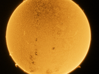 (EDITOR'S NOTE: This image was captured with an H-Alpha solar telescope and is the result of stacking 200 exposures. The final stacked image...