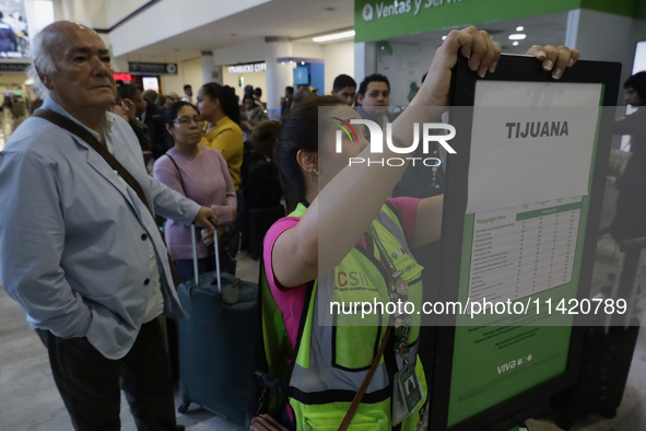 People are experiencing complications with their flights inside the International Airport of Mexico City, Mexico, due to a Microsoft compute...