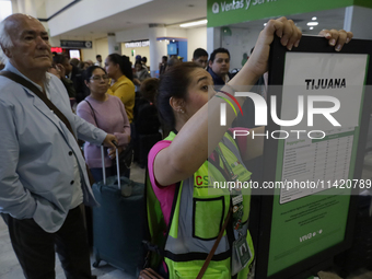 People are experiencing complications with their flights inside the International Airport of Mexico City, Mexico, due to a Microsoft compute...