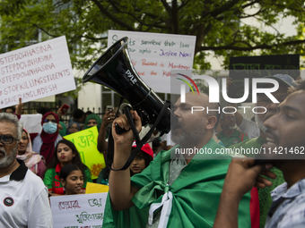 The Bangladeshi community is holding a rally in front of the country's Embassy in Washington DC, USA, on July 19, 2024. They are demanding a...