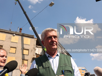 UN High Commissioner for Refugees Filippo Grandi is visiting the site of the aftermath of the Russian missile attack on a residential apartm...