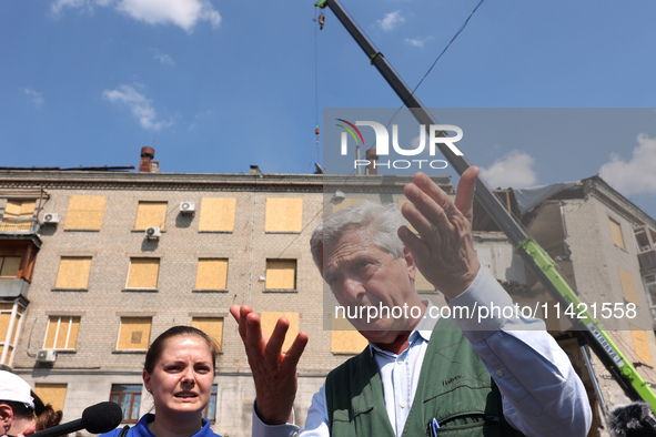 UN High Commissioner for Refugees Filippo Grandi is visiting the site of the aftermath of the Russian missile attack on a residential apartm...