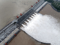 Floodwater is being released from seven drainage holes at the Three Gorges Hub of the Yangtze River in Yichang, China, on July 20, 2024. (