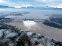 Floodwater is being released from seven drainage holes at the Three Gorges Hub of the Yangtze River in Yichang, China, on July 20, 2024. (