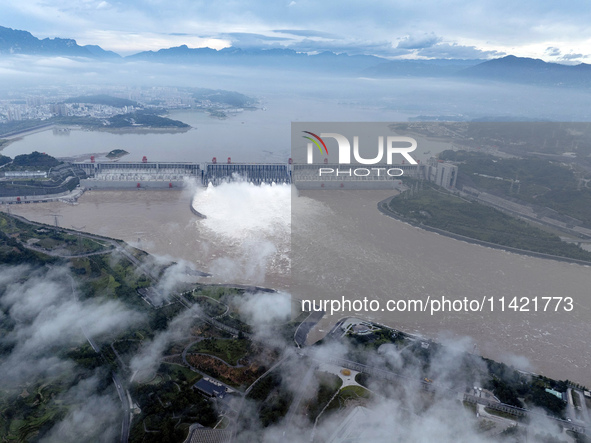 Floodwater is being released from seven drainage holes at the Three Gorges Hub of the Yangtze River in Yichang, China, on July 20, 2024. 