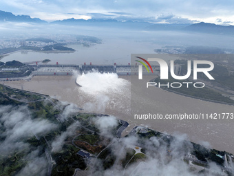 Floodwater is being released from seven drainage holes at the Three Gorges Hub of the Yangtze River in Yichang, China, on July 20, 2024. (