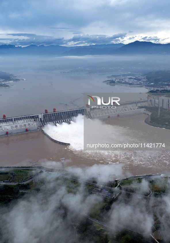 Floodwater is being released from seven drainage holes at the Three Gorges Hub of the Yangtze River in Yichang, China, on July 20, 2024. 