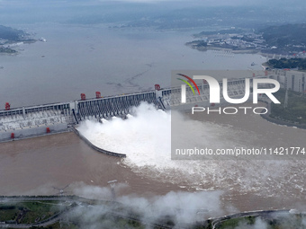 Floodwater is being released from seven drainage holes at the Three Gorges Hub of the Yangtze River in Yichang, China, on July 20, 2024. (