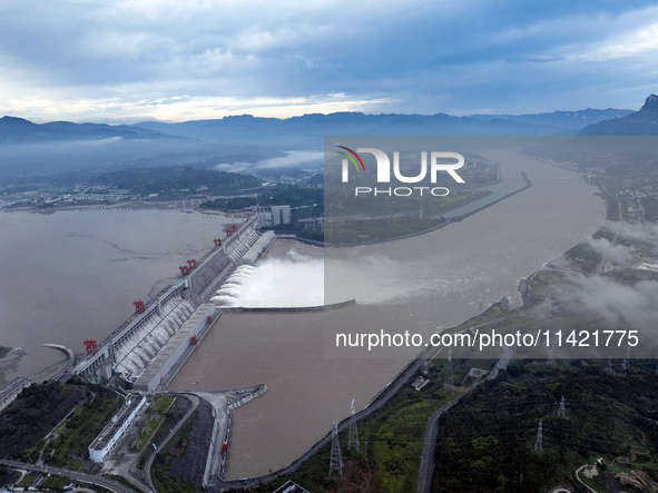 Floodwater is being released from seven drainage holes at the Three Gorges Hub of the Yangtze River in Yichang, China, on July 20, 2024. 