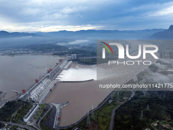 Floodwater is being released from seven drainage holes at the Three Gorges Hub of the Yangtze River in Yichang, China, on July 20, 2024. (