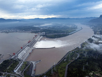 Floodwater is being released from seven drainage holes at the Three Gorges Hub of the Yangtze River in Yichang, China, on July 20, 2024. (