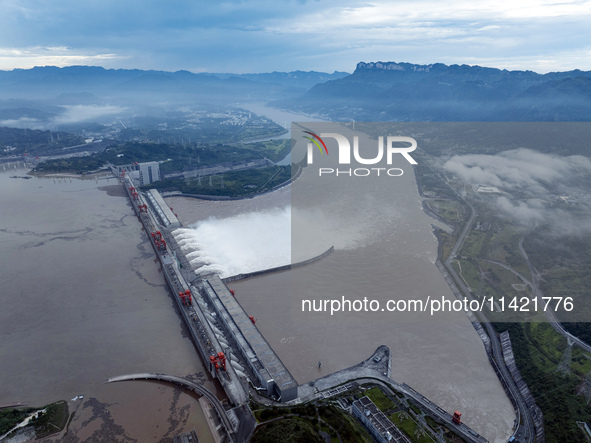 Floodwater is being released from seven drainage holes at the Three Gorges Hub of the Yangtze River in Yichang, China, on July 20, 2024. 