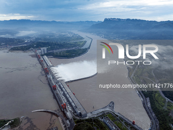 Floodwater is being released from seven drainage holes at the Three Gorges Hub of the Yangtze River in Yichang, China, on July 20, 2024. (