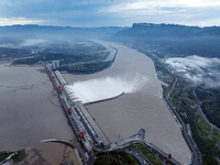 Floodwater is being released from seven drainage holes at the Three Gorges Hub of the Yangtze River in Yichang, China, on July 20, 2024. (