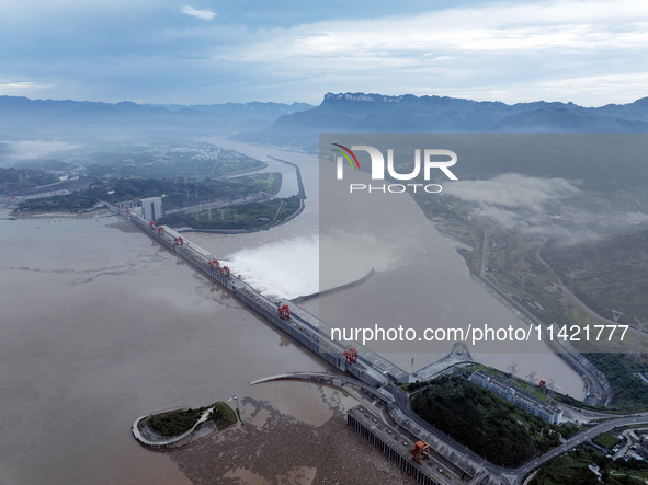 Floodwater is being released from seven drainage holes at the Three Gorges Hub of the Yangtze River in Yichang, China, on July 20, 2024. 