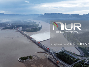 Floodwater is being released from seven drainage holes at the Three Gorges Hub of the Yangtze River in Yichang, China, on July 20, 2024. (