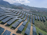 The barren mountains of the past are now filling with solar photovoltaics in Li Mawu Village, Yuncheng City, Shanxi Province, China, on July...