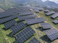 The barren mountains of the past are now filling with solar photovoltaics in Li Mawu Village, Yuncheng City, Shanxi Province, China, on July...