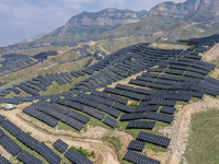 The barren mountains of the past are now filling with solar photovoltaics in Li Mawu Village, Yuncheng City, Shanxi Province, China, on July...