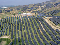 The barren mountains of the past are now filling with solar photovoltaics in Li Mawu Village, Yuncheng City, Shanxi Province, China, on July...