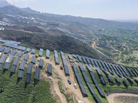 The barren mountains of the past are now filling with solar photovoltaics in Li Mawu Village, Yuncheng City, Shanxi Province, China, on July...