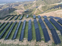 The barren mountains of the past are now filling with solar photovoltaics in Li Mawu Village, Yuncheng City, Shanxi Province, China, on July...