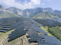 The barren mountains of the past are now filling with solar photovoltaics in Li Mawu Village, Yuncheng City, Shanxi Province, China, on July...