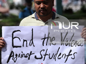 Nepali students, who are also members of the All Nepal National Free Students Union (Unified Socialist), are holding a demonstration in soli...