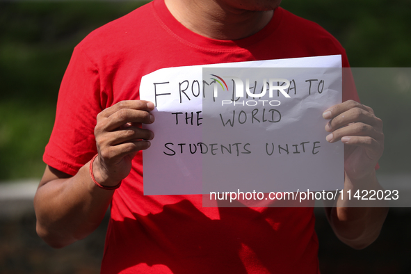 Nepali students, who are also members of the All Nepal National Free Students Union (Unified Socialist), are holding a demonstration in soli...