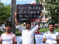 Nepali students, who are also members of the All Nepal National Free Students Union (Unified Socialist), are holding a demonstration in soli...