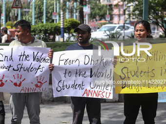 Nepali students, who are also members of the All Nepal National Free Students Union (Unified Socialist), are holding a demonstration in soli...