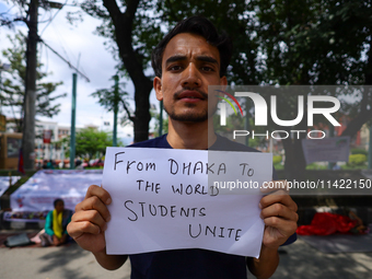 Nepali students affiliated with the All Nepal National Free Students Union (Unified Socialist) are holding a solidarity demonstration in sup...