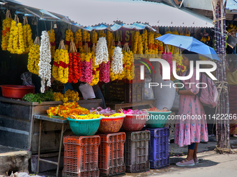 Merchants are selling floral garlands in the East Fort in Thiruvananthapuram (Trivandrum), Kerala, India, on April 13, 2024. (