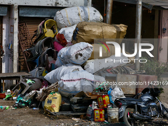 Sacks are being filled with collected scrap items in Haldwani, Uttarakhand, India, on April 23, 2024. (