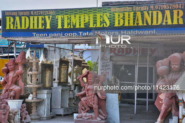 A shop is selling idols of Hindu gods and goddesses in Haldwani, Uttarakhand, India, on April 23, 2024. 