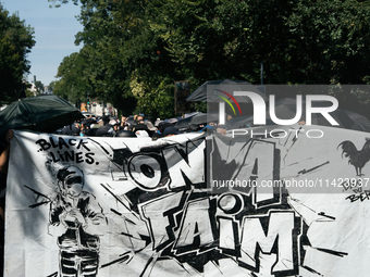 Protesters of Extinction Rebellion are holding a banner that reads ''we are hungry'' during a demonstration against the construction of a gi...