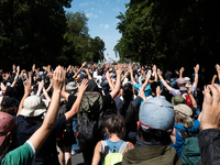 Protesters are walking among a park during a demonstration against the construction of a giant water reservoir (mega-bassine) in La Rochelle...