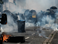 French gendarmes are using tear gas against demonstrators during a demonstration against the construction of a giant water reservoir (mega-b...