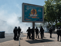 French gendarmes are using tear gas against demonstrators during a demonstration against the construction of a giant water reservoir (mega-b...