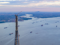 The photo is showing the Chang-Tai Yangtze River Bridge under construction in Taixing, Jiangsu province, China, on July 21, 2024. (