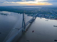 The photo is showing the Chang-Tai Yangtze River Bridge under construction in Taixing, Jiangsu province, China, on July 21, 2024. (