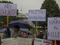 Demonstrators of the Bangladeshi community are displaying signs with the words ''No Quota, Free Free Bangladesh, Hang the Killer'' among oth...