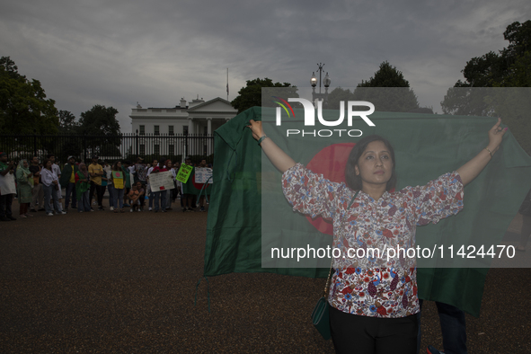 Rokeya Hashi, a Bangladeshi demonstrator, is posing for a photograph during a rally in front of the White House, Washington DC, USA, on July...