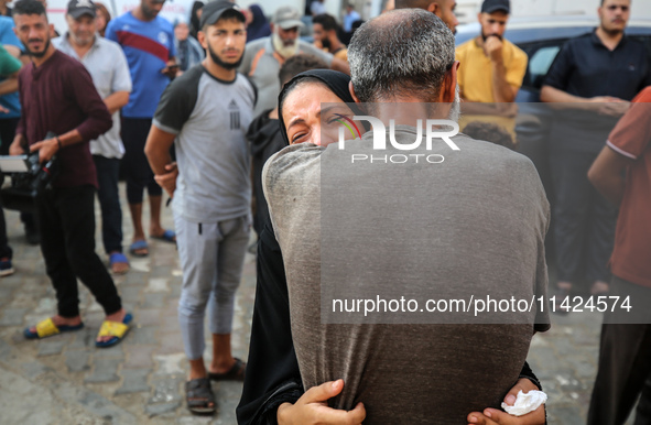 Relatives of the Palestinians, who are dying in Israeli attacks, are mourning at Al-Aqsa Martyr's Hospital in Deir al-Balah, Gaza, on July 2...