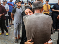 Relatives of the Palestinians, who are dying in Israeli attacks, are mourning at Al-Aqsa Martyr's Hospital in Deir al-Balah, Gaza, on July 2...