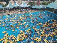 A large number of tourists are cooling off at a water park in Hangzhou, China, on July 21, 2024. (