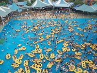 A large number of tourists are cooling off at a water park in Hangzhou, China, on July 21, 2024. (