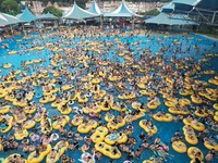 A large number of tourists are cooling off at a water park in Hangzhou, China, on July 21, 2024. (