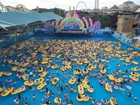 A large number of tourists are cooling off at a water park in Hangzhou, China, on July 21, 2024. (