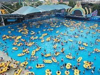 A large number of tourists are cooling off at a water park in Hangzhou, China, on July 21, 2024. (